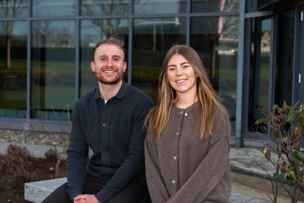 Cammy on left and Annie on right smiling at camera.